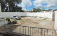 A 1 MINUTE D’ANKORONDRANO – LOCAL BUREAU /VILLA T9 DE 600M² AVEC GRAND PARKING AVEC BELLE VUE SUR LE LAC MASAY A DEUX PAS DE LA ROUTE PRINCIPALE A ANDRANOBEVAVA – REF : 2025-ANKLC0320